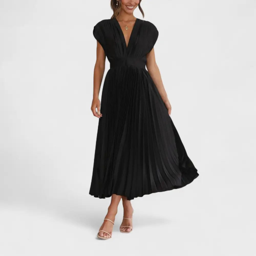 Rocío – Vestido Plisado que Resalta la Belleza Atemporal
